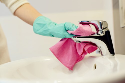 Local technician assessing a fabric stain in Maidavale